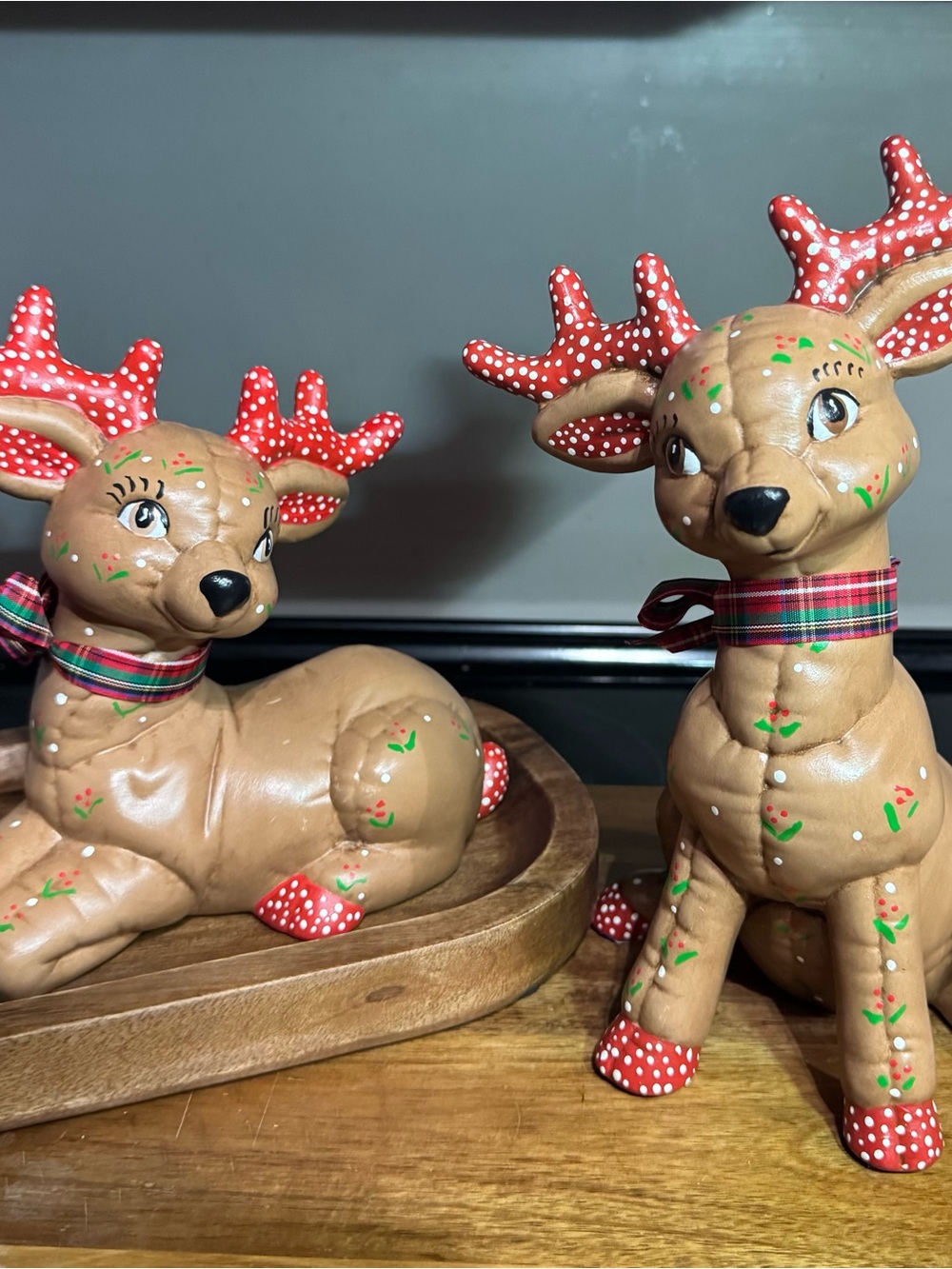 Festive Tan Reindeer Figurine Set with Red Accents